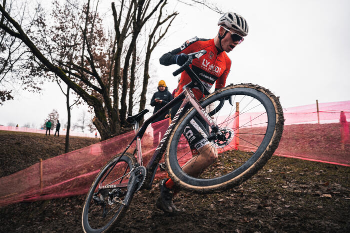 A rider jumps a bank with the bike